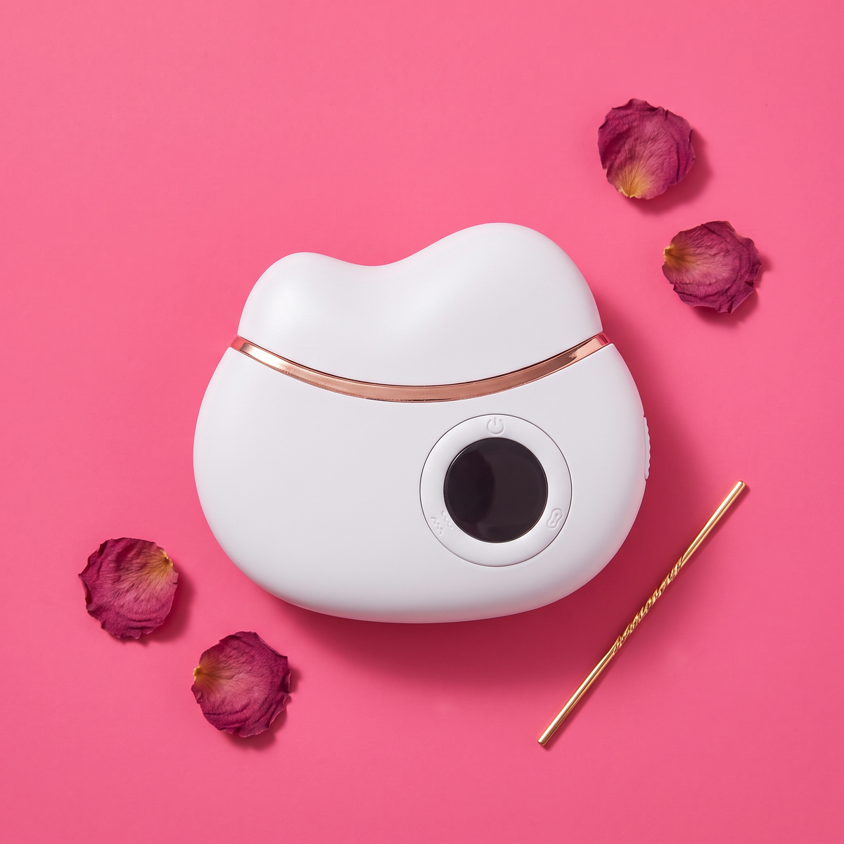 The Ivory Pro Gua Sha styled flat lay with rose petals