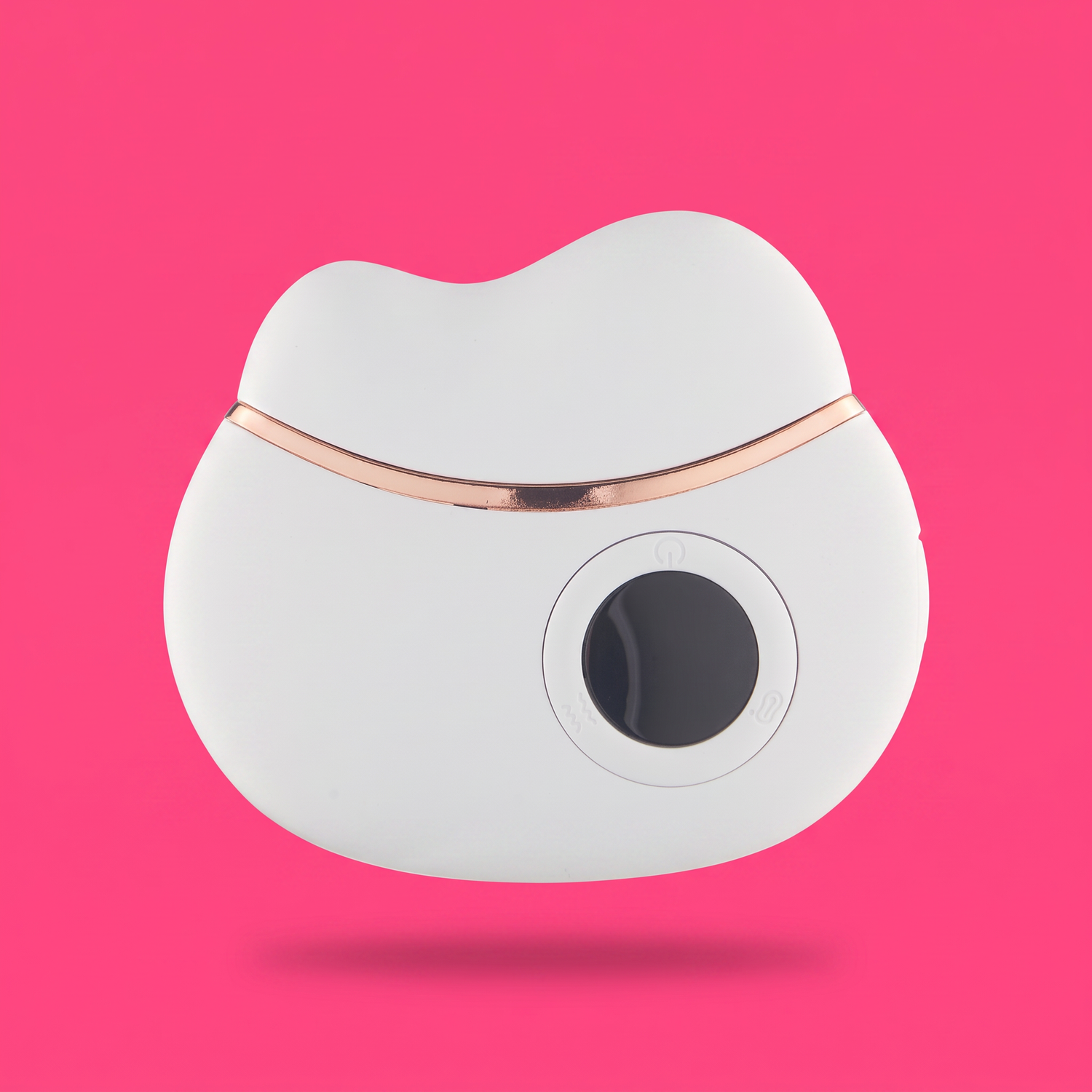 The Ivory Pro Gua Sha on hot pink studio background