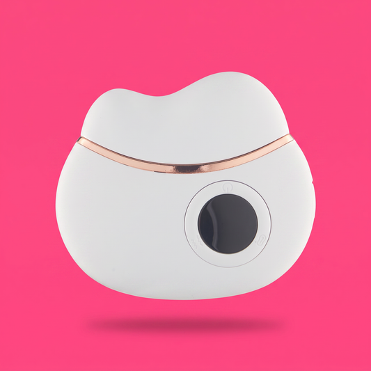 The Ivory Pro Gua Sha on hot pink studio background