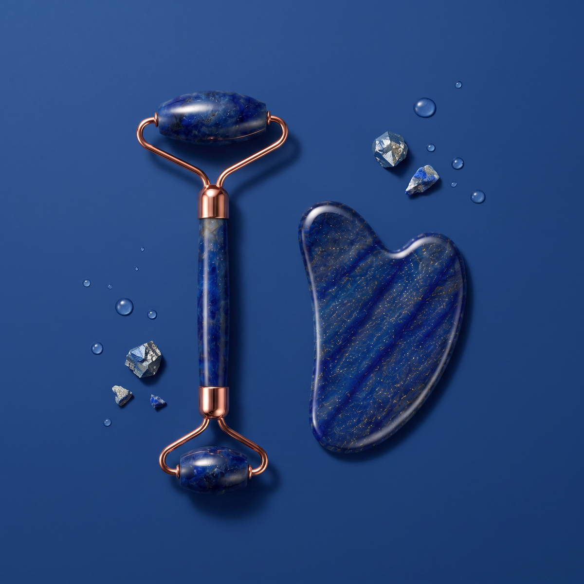 The Deep Blue Set styled flat lay on blue surface