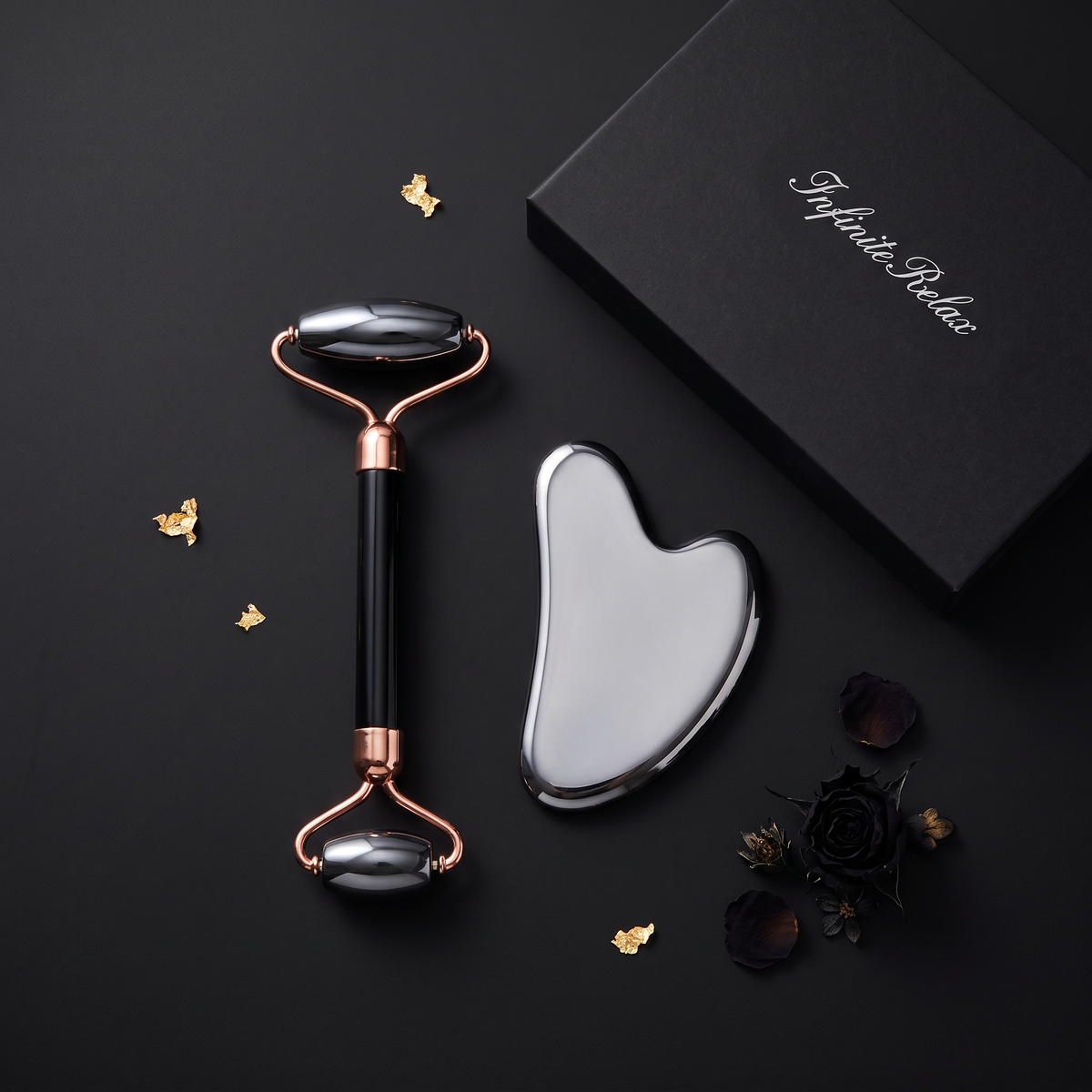 The Midnight Set styled flat lay on black surface