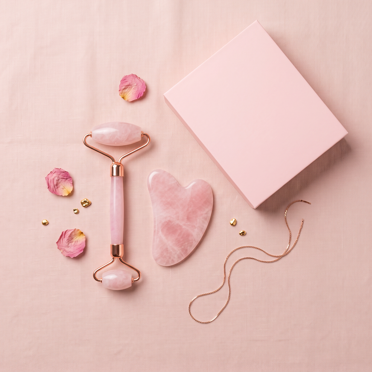 The Rose Quartz Set styled flat lay with rose petals